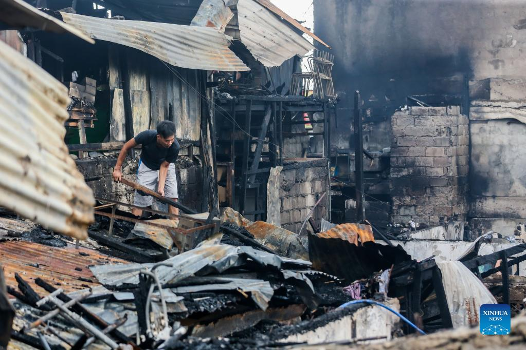 Aftermath of fire at residential area in Quezon City, the Philippines ...