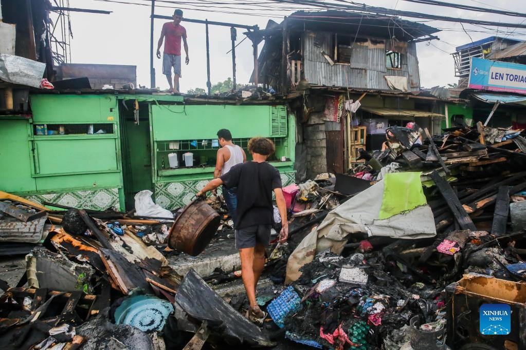 Aftermath of fire at residential area in Quezon City, the Philippines ...