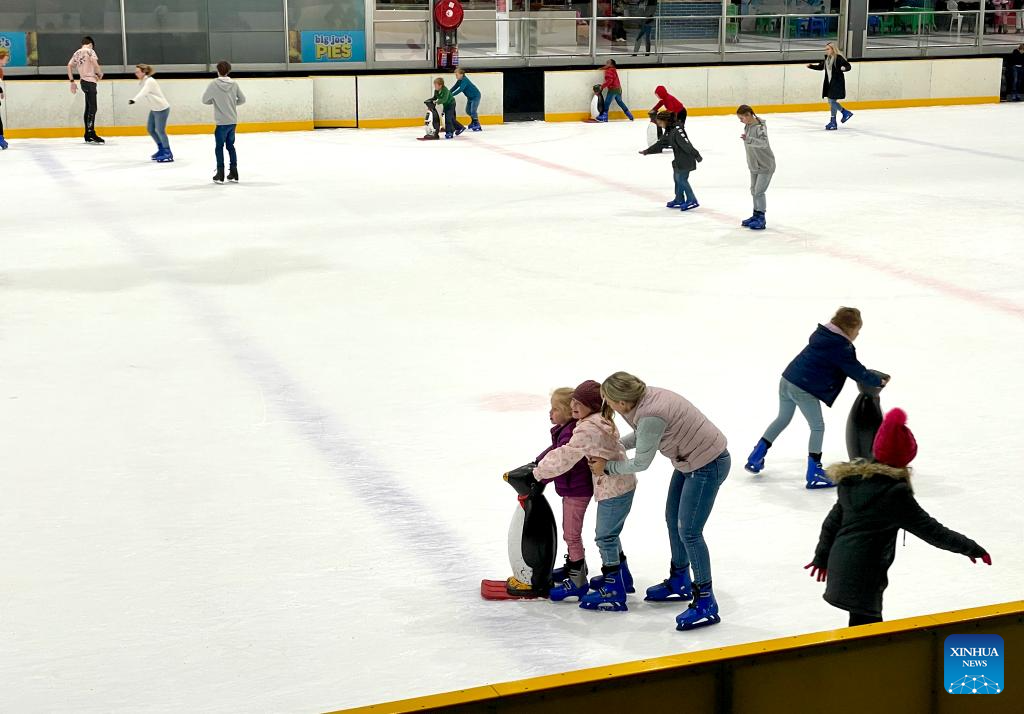 People skate at ice rink in Johannesburg, South AfricaXinhua