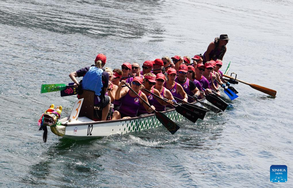 Feature: Dragon boat races making waves in sports-mad, multicultural ...