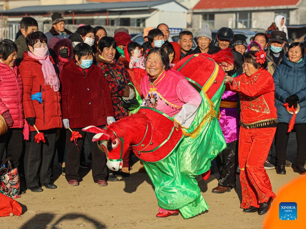 People across China organize activities to greet New Year-Xinhua