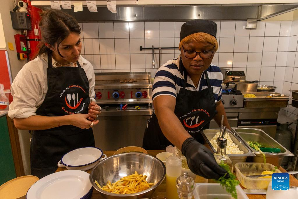 Feature: Chefs team up in Athens restaurants to mark World Refugee Day ...