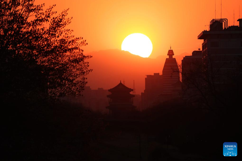 Sunset view seen from Ming Dynasty City Wall Relics Park in Beijing -Xinhua