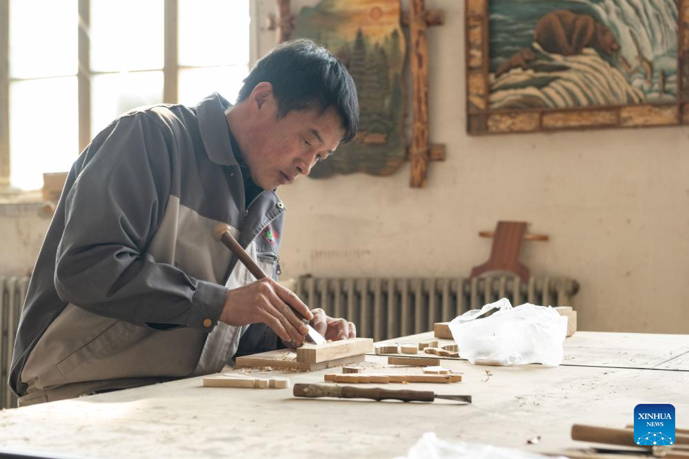 NE China's Yichun develops woodcraft industry to boost local economyXinhua