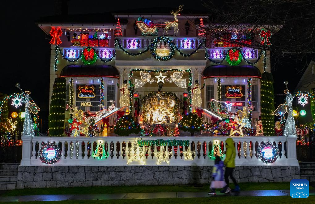 Residential houses adorned with Christmas decorations in Vancouver
